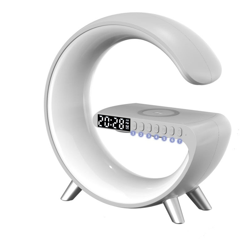 G-shaped lamp with speaker, clock and charger